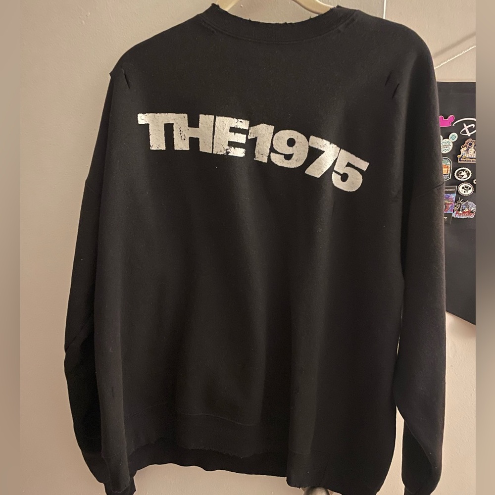 The 1975 distressed crewneck sweatshirt